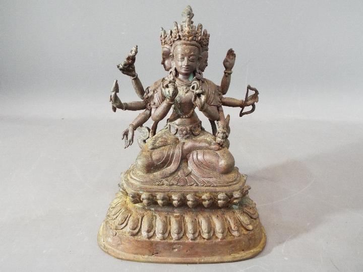 Buddha - An 18th century Chinese / Tibetan Usnisavijaya Buddhist eight arm god of war,