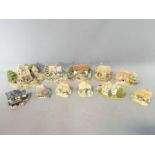 A collection of eleven Lilliput Lane models, all unboxed, to include 'Bluebell Farm', 'Summer Days',