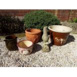 Four garden planters / jardinieres of various sizes ranging from 16 cm to 30 cm and a stoneware