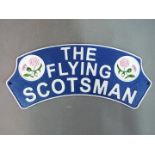 A cast iron 'Flying Scotsman' wall plaque.