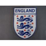 A cast iron England football wall plaque.