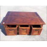 John Lewis - a solid wood coffee table/storage cabinet with three drawers and half the table top