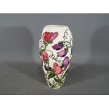 Moorcroft Pottery - a vase decorated in the Sweetness pattern,