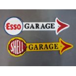 Two cast iron 'Garage' signs.