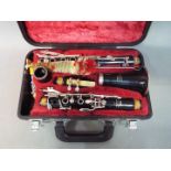 A Yamaha 26ii clarinet contained in hard case.