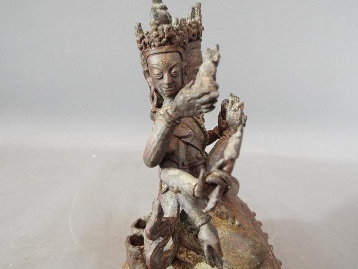 Buddha - An 18th century Chinese / Tibetan Usnisavijaya Buddhist eight arm god of war, - Image 9 of 9