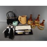 A mixed lot comprising ceramics to include Sylvac, Carlton Ware, Bell's whisky decanters,