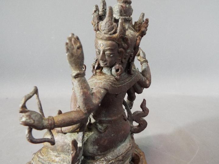 Buddha - An 18th century Chinese / Tibetan Usnisavijaya Buddhist eight arm god of war, - Image 6 of 9