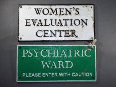 A 'Psychiatry' and 'Womens Evaluation' signs (zp&we)