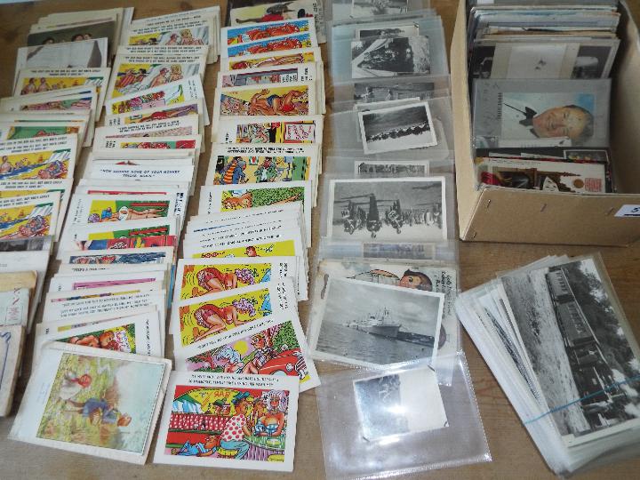 An accumulation of postcards, photographs and ephemera to include comic, railway photographs,