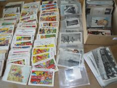 An accumulation of postcards, photographs and ephemera to include comic, railway photographs,