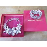 A lady's good quality facetted glass necklace and bracelet by Butler & Wilson,
