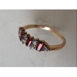 A lady's hallmarked 9 carat gold dress ring set with 12 stones, approx weight _ gm (all in),