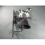 A cast bell with a depiction of a Springer Spaniel approximately 38cms (H)x 15cms (W) x 23cms (D)