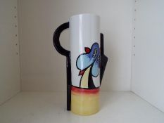 Lorna Bailey - a cylindrical jug decorated in the Lakeside pattern, signed to the base, 23.