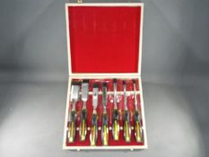 A deluxe wood chisel set.