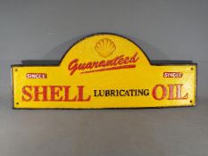 A cast Shell sign (domed) measuring approximately 50 cms in length.