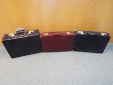 Three briefcases to include one by 'Hunter'.