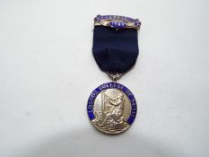 A Silver London College of Music medal
