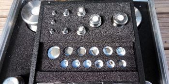 Scientific - a set of calibration weights previously owned by Wigan trading standards in hard