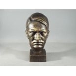 A cast bust depicting Hitler measuring 21cm (H) x 10cm (W) x 13cm (D) (xhibz)