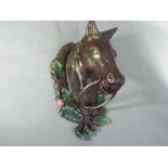 A cast horse head door knocker (XHHD)