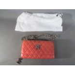 Handbags - a very good quality pink leather handbag marked Chanel Paris with cris cross stitched