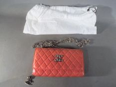 Handbags - a very good quality pink leather handbag marked Chanel Paris with cris cross stitched