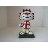 Lorna Bailey - a figurine depicting an England Football Cat, signed to the base, 13.