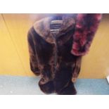 A lady's 3/4 length fur coat (vendor states that coat is beaver fur) , slip pockets,