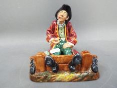 Royal Doulton - a rare early figurine entitled 'In the Stocks' HN2163, approx 15 cm (high),