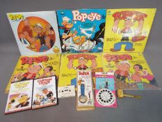 Popeye - A mixed lot of Popeye related items to include six 33 RPM vinyl records containing Popeye