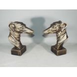 A pair of cast Greyhound heads each measures approximately 23 cms in height.