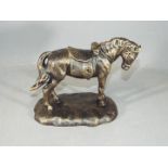 A cast figure of a horse on a base measuring approximately 16 cms in height.