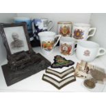 A mixed lot of military and Royal memorabilia to include an early 20 th century (WW1) NAAFI crested