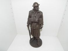 A cold cast bronze 1:6 scale figurine depicting a World War Two (WW2) 2nd AIF Infantry Sargeant,