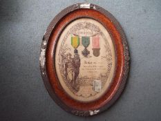 World War One (WW1) - a French oval display plaque, 1914-1918 with Croix de Guerre with star,