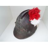 A late 19th / early 20th century French fireman's Adrian pattern brass helmet with side plume