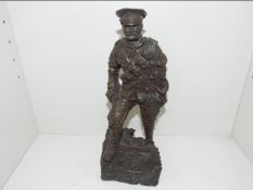 The Horse Gunner - a sculpture depicting a World War One (WW1) Gunner on stylised base scribed