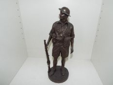 A cold cast bronze 1:6 scale figurine depicting a World War Two (WW2) 9th Division Australian