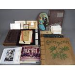 A mixed lot to include photograph and postcard albums, trench art, Soldbuch,