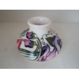 Moorcroft Pottery - a squat vase decorat