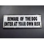 A large 'Beware of the Dog' sign - appro