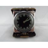 An Art Deco styled purse watch or small travelling clock,