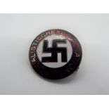 An enamel badge with a German design