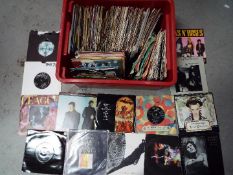 Approximately two hundred 7” vinyl records, predominantly rock and pop to include Tamla Motown,
