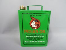 A green Indian Oil petrol can