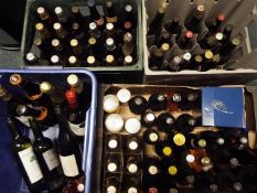 A large collection of vintage bottles of beer (unopened), and a quantity of wine.