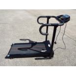 A Fitness Club folding, electric treadmill.