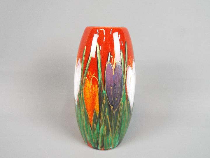 Anita Harris - an Anita Harris vase with crocus design signed to the base, approximate height 17.